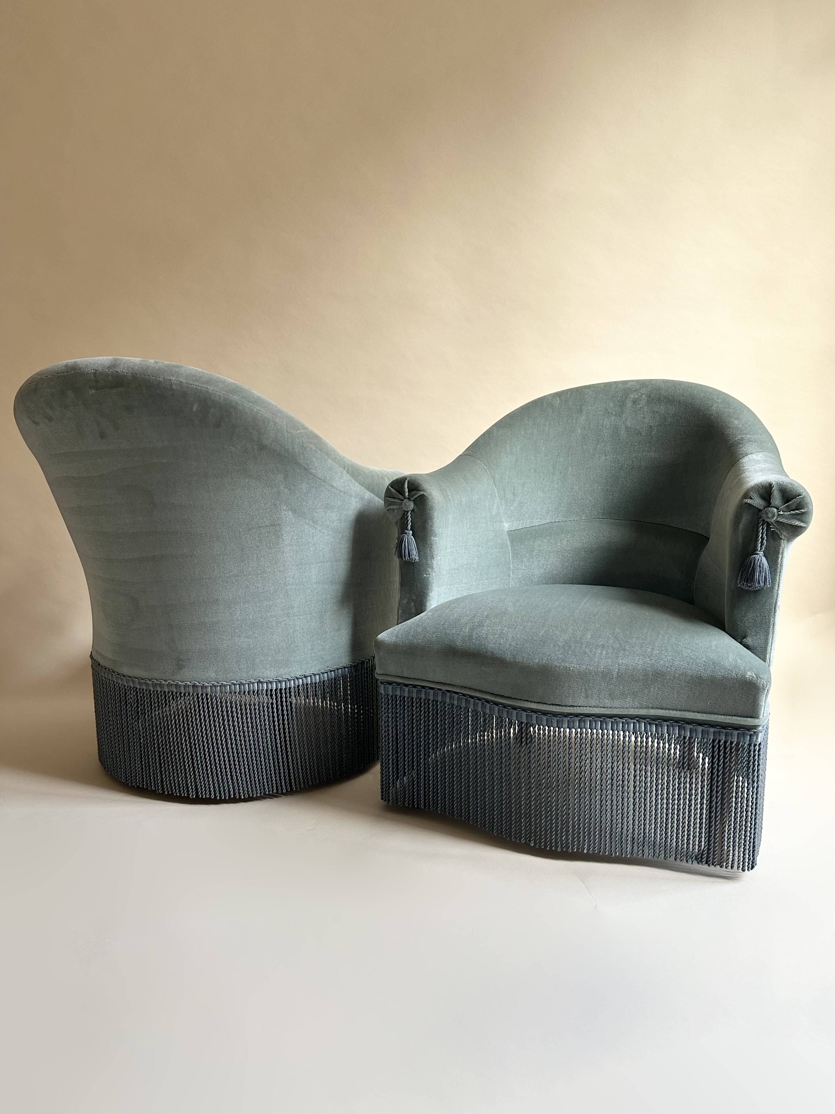 Blue velvet frog armchairs
