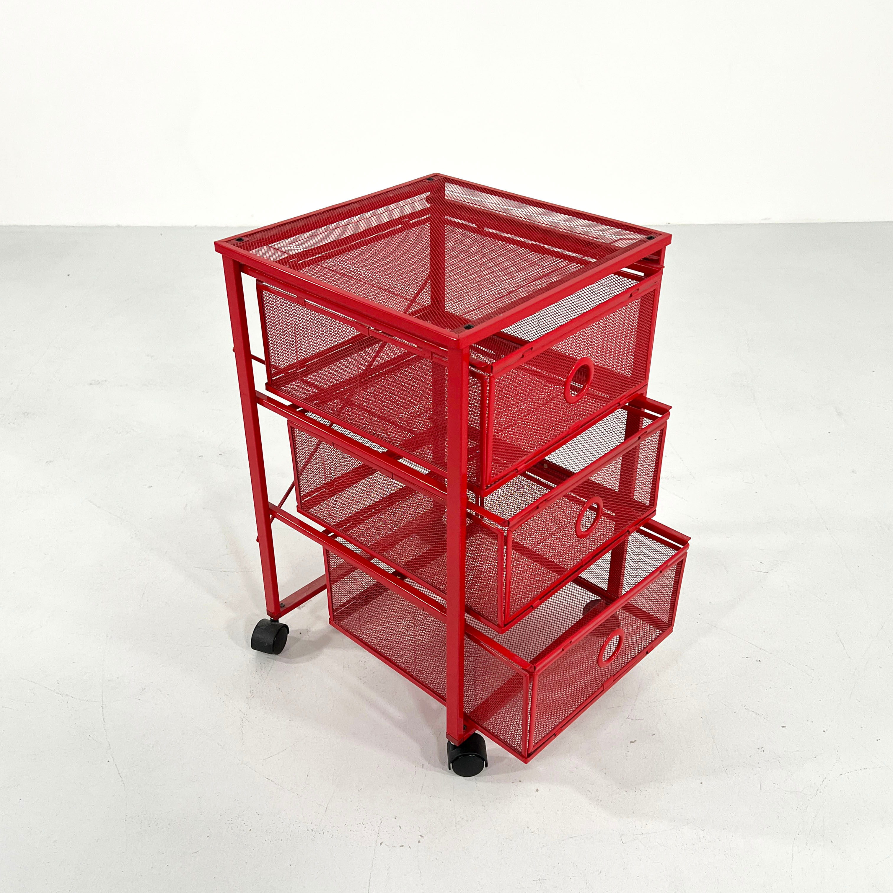 Chest of drawers on red metal wheels, 1980