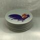 Set of eight limoges porcelain dessert plates Annie Grenade