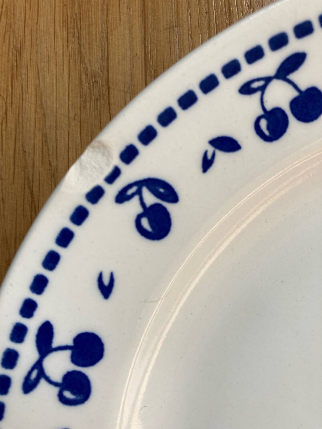 Vintage dessert plates with blue cherry pattern