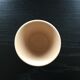 Ceramic cup with a signed decoration