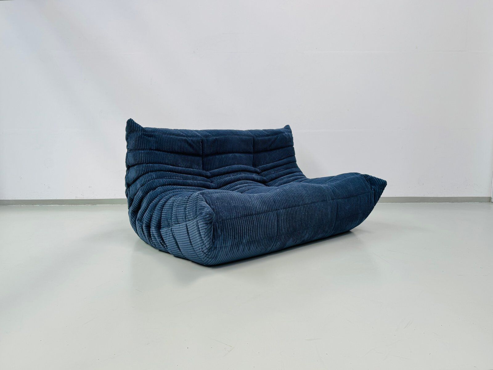 French Togo 2-seater sofa in blue corduroy attributed to Michel Ducaroy for Ligne Roset, 1970s