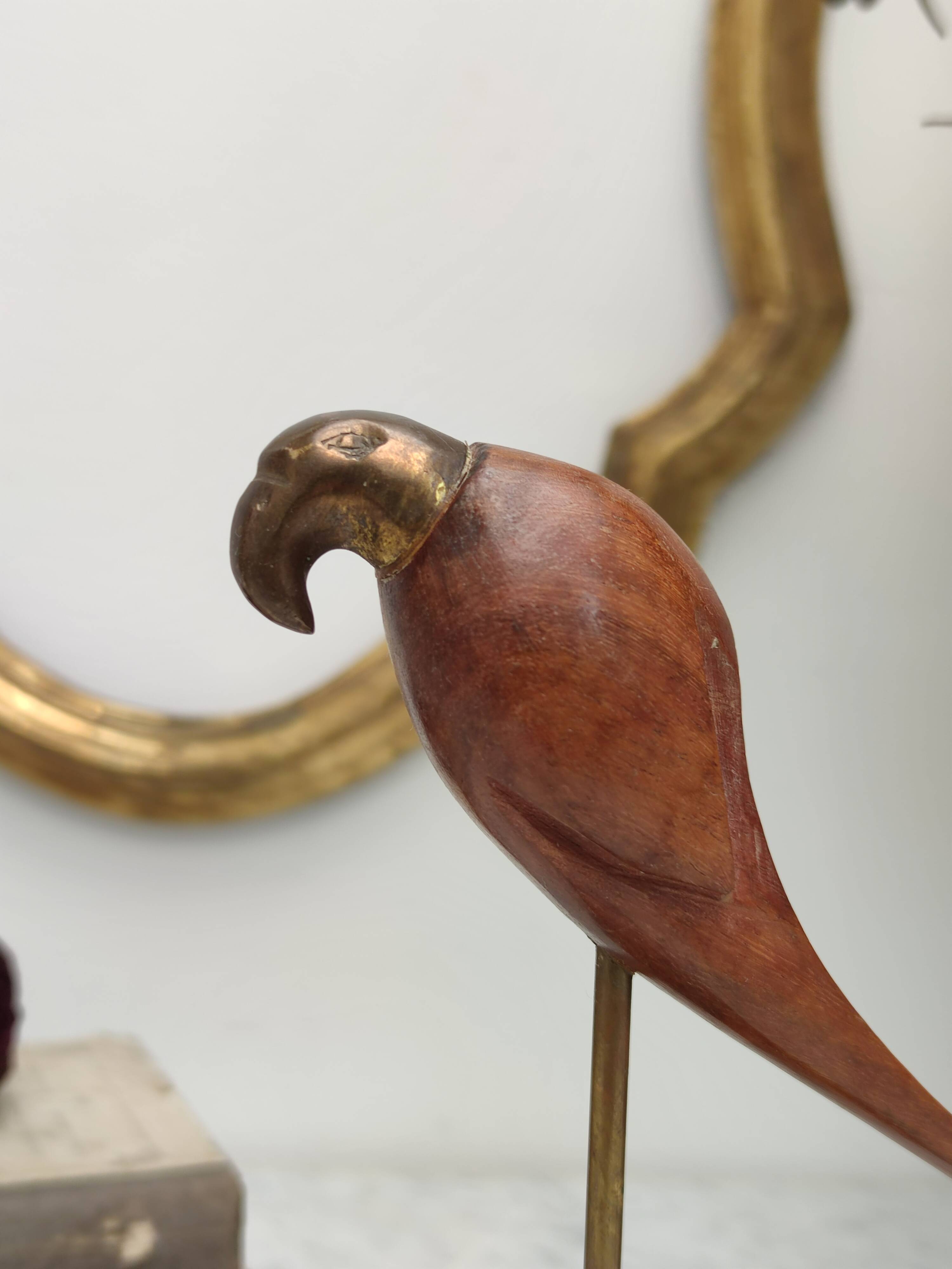 Teak and brass parrot