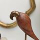 Teak and brass parrot