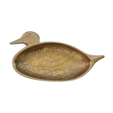 Empty brass pocket forming a duck