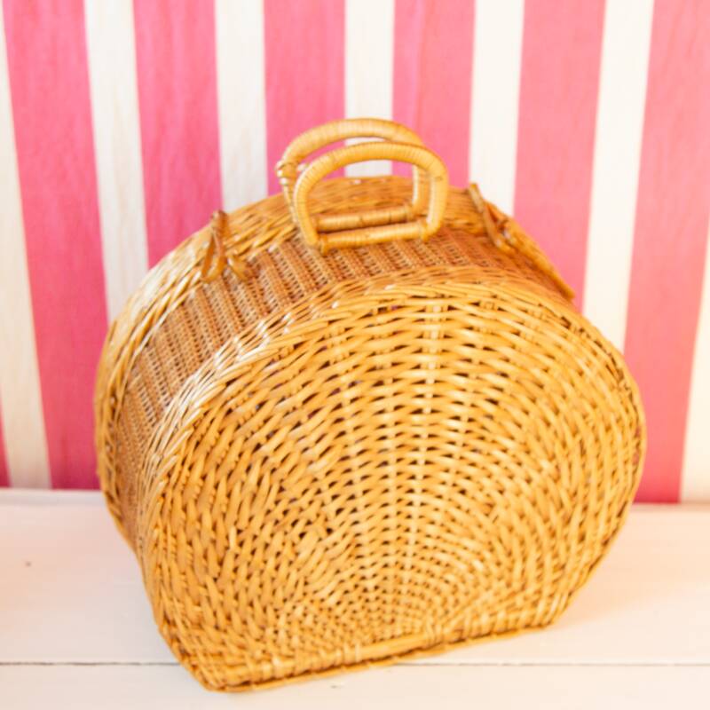 Round wicker suitcase