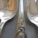 11 silver metal spoons