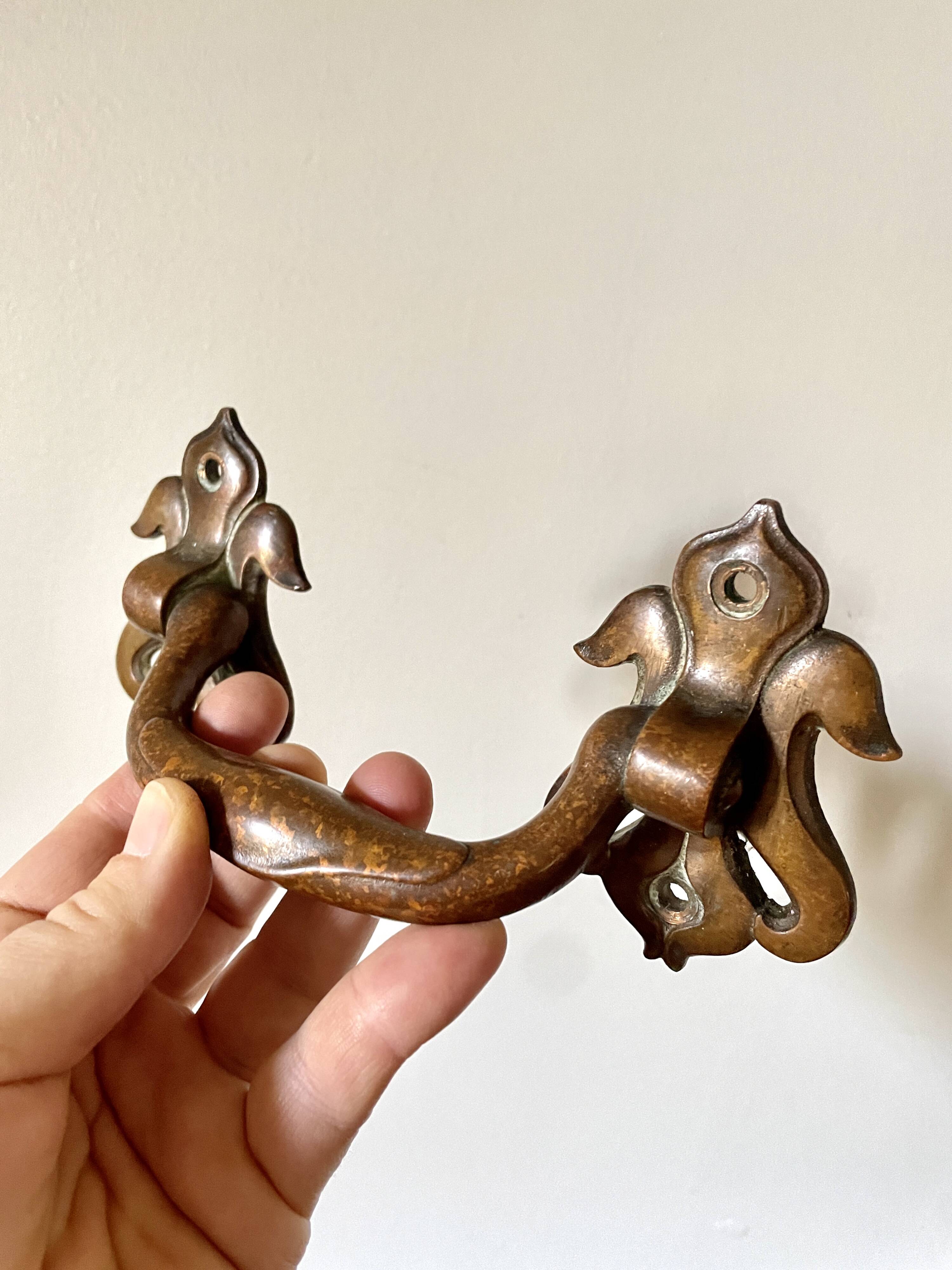 Pair of bronze handles by Emile Muller, 19th century.