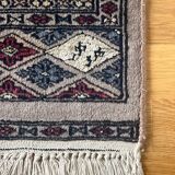 Antique Persian rug, signed.
