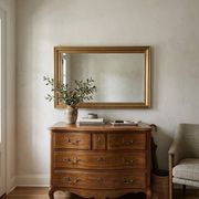 Golden mirror in oak from the 19th century.