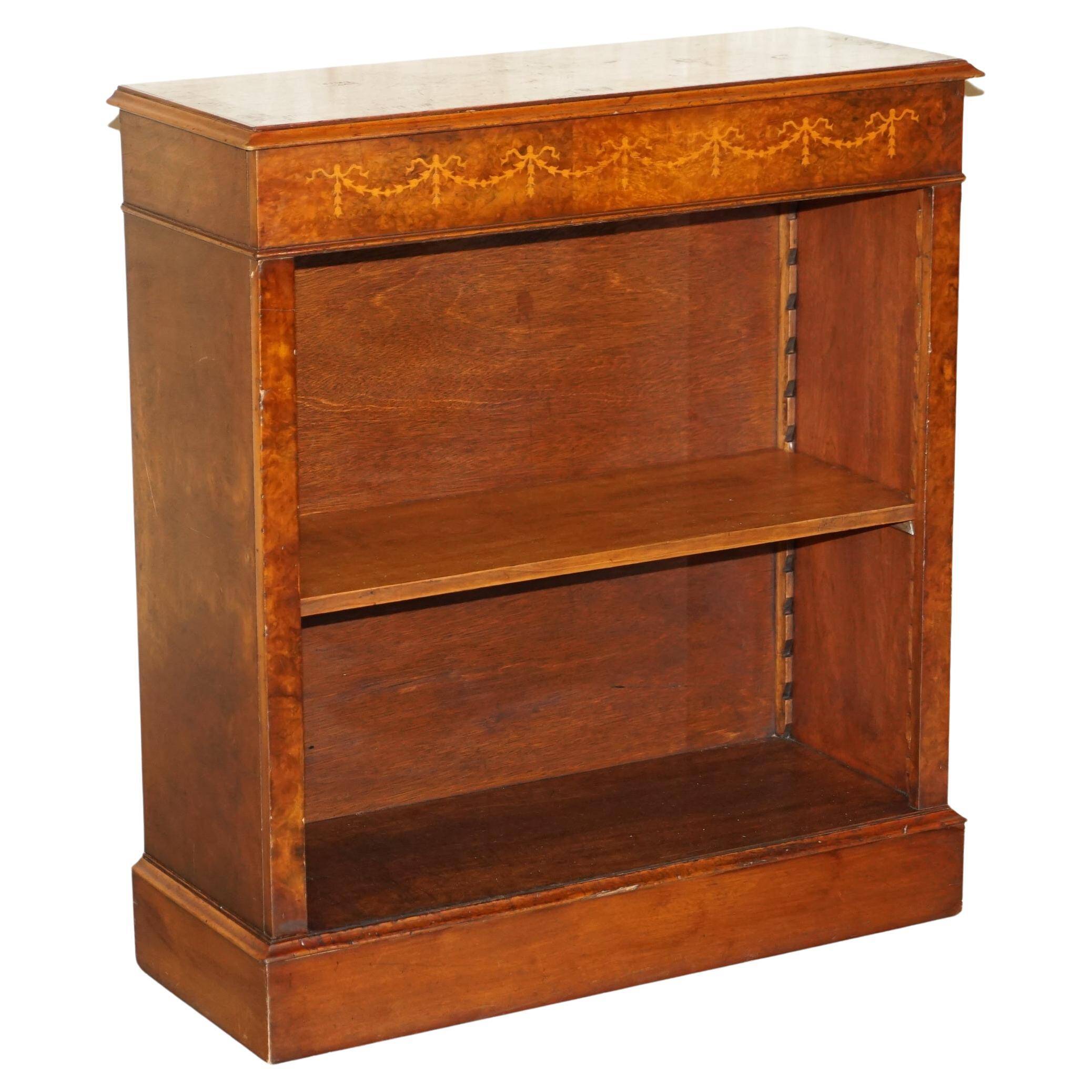 Brights of Nettlebed style Sheraton dwarf library in burr elm, walnut, and mahogany.