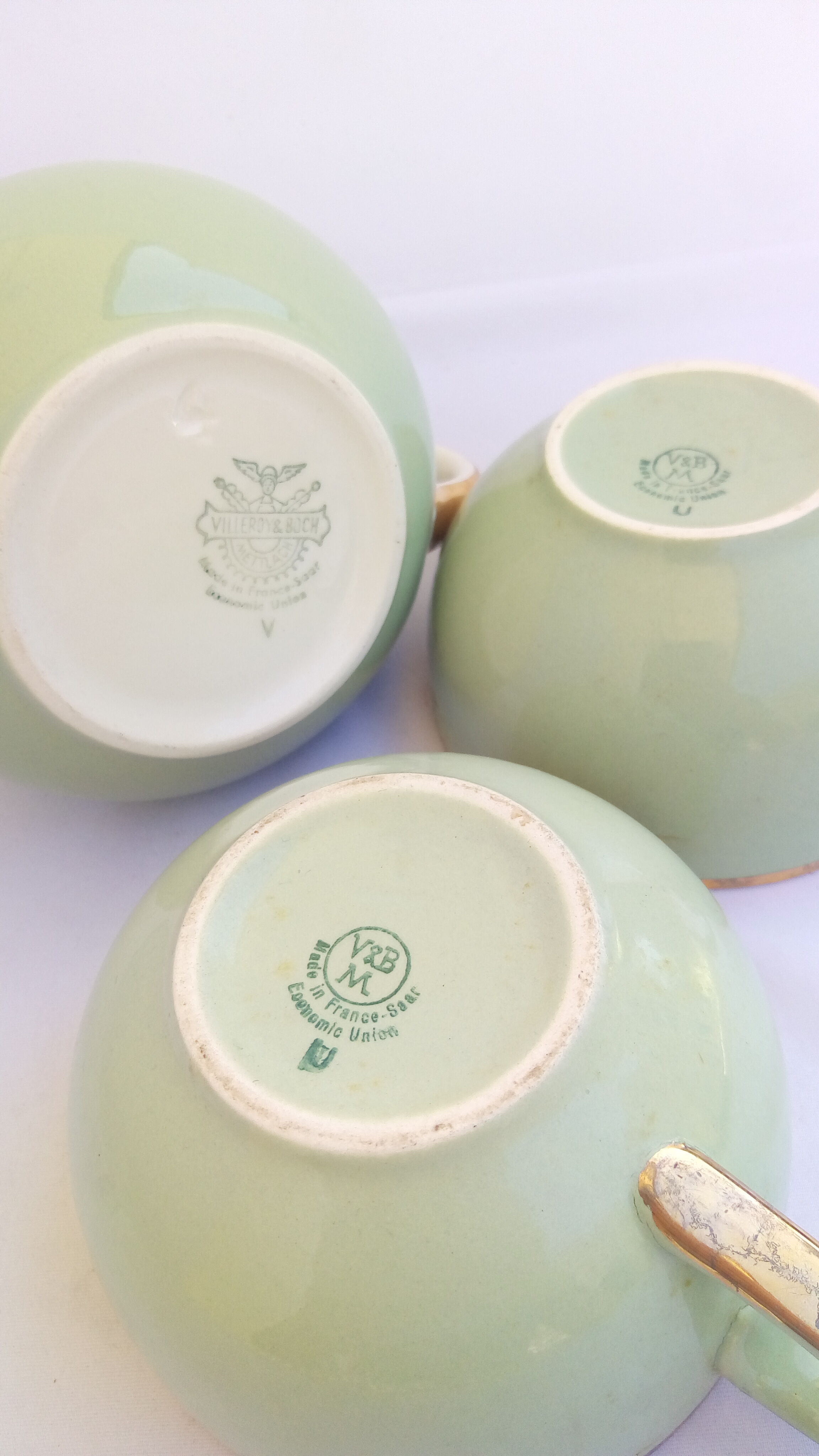 Villeroy cups and pitchers and boch 'We Two' pastel green and gold