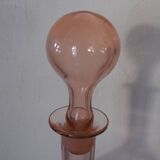 Pink transparent glass carafe with bubble cap