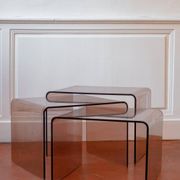 Vintage trio of nesting tables in smoked plexiglass by Michel Dumas, year.