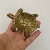 Vintage brass turtle pocket emptier