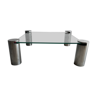 Table basse carrée en verre transparent avec pieds cylindriques en acier inoxydable