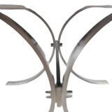 Polished metal and ceramic dining table. 1970s.