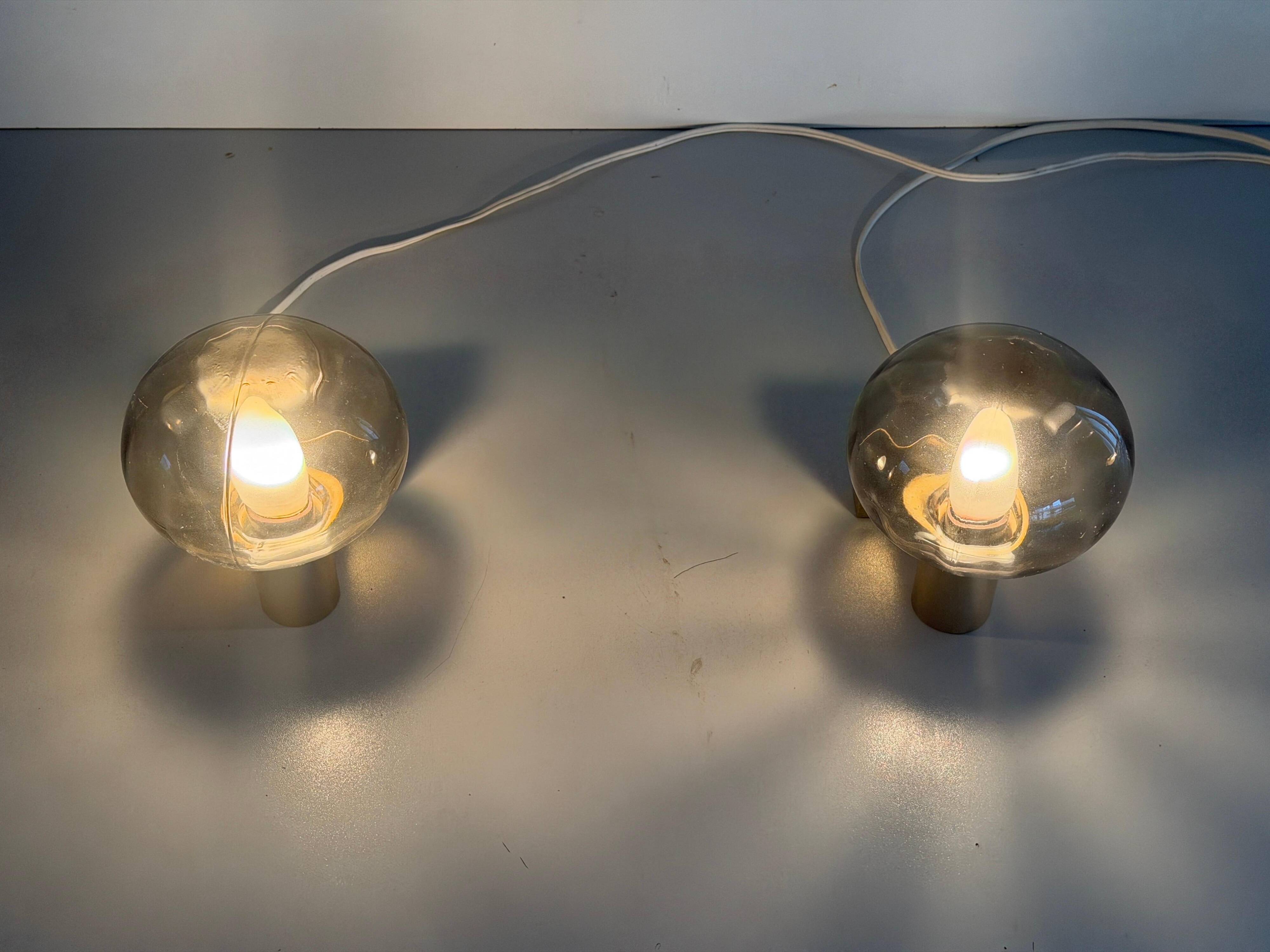 Pair of grey glass and chrome wall lights from the mid-century by N Leuchten, 1960s, Germany.