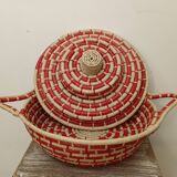 Red and beige woven basket with lid