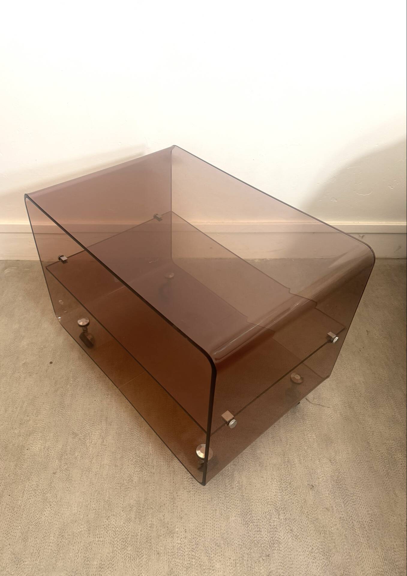 Coffee table / serving table in smoked plexiglass by Michel Dumas