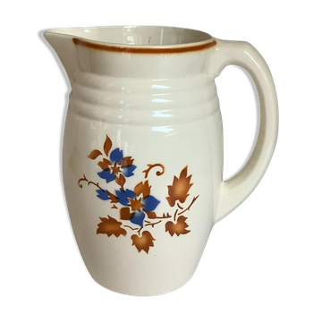 Old jug pitcher with stencil pattern