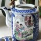 Japanese fine porcelain teapot, Geisha/cherry blossom patterns, Bamboo imitation handle