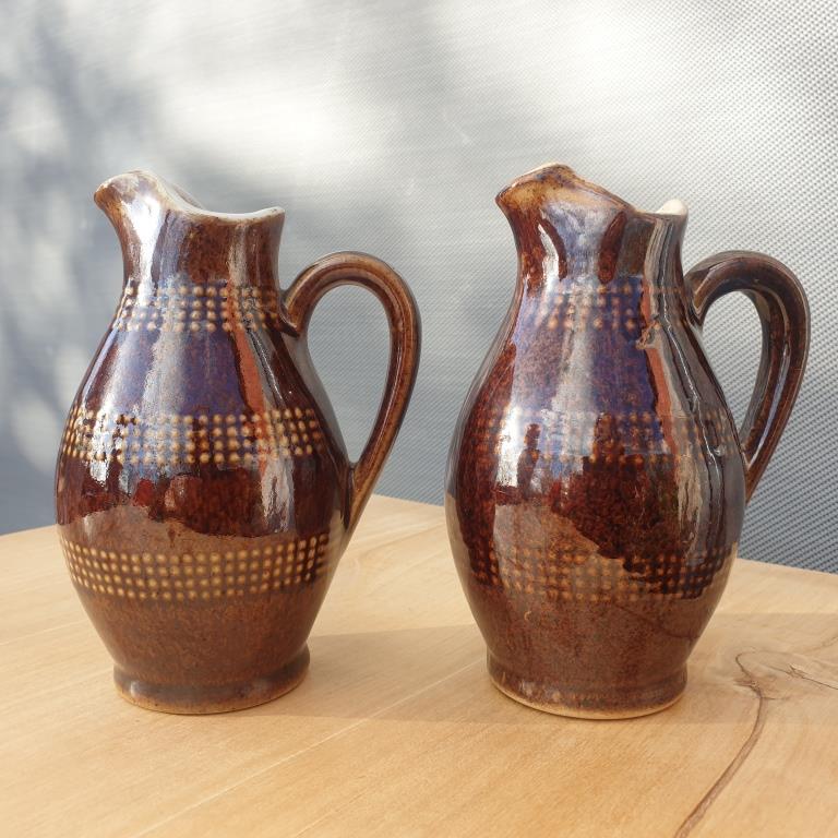 Pair of Renault sandstone pitchers pourers of the 7 dwarfs