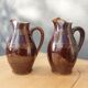 Pair of Renault sandstone pitchers pourers of the 7 dwarfs