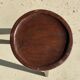 Brown solid wood stool seated circular dug