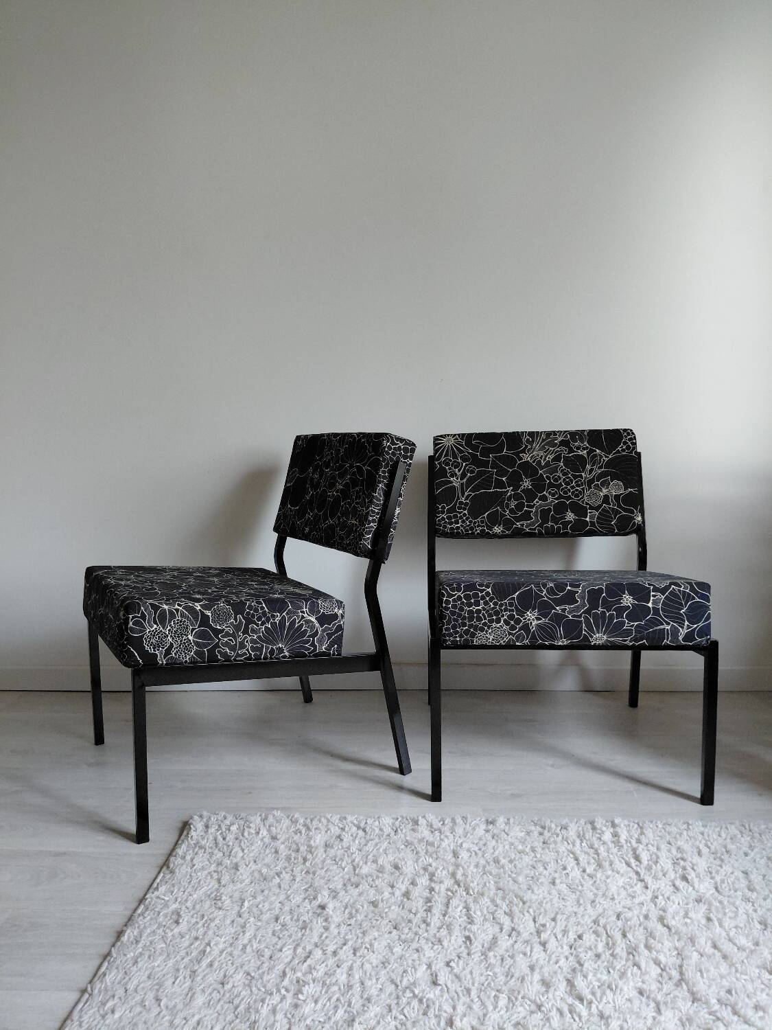 Pair of black metal and fabric armchairs, 1970s, restored.