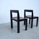 Set of eight black lacquered dining chairs