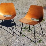 Pair of tonneau chairs by Pierre Guariche plywood base tubes 1954