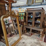Large carved and gilded wooden mirror in Louis XV style
