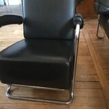 Sofa and armchair in chrome metal and black leather