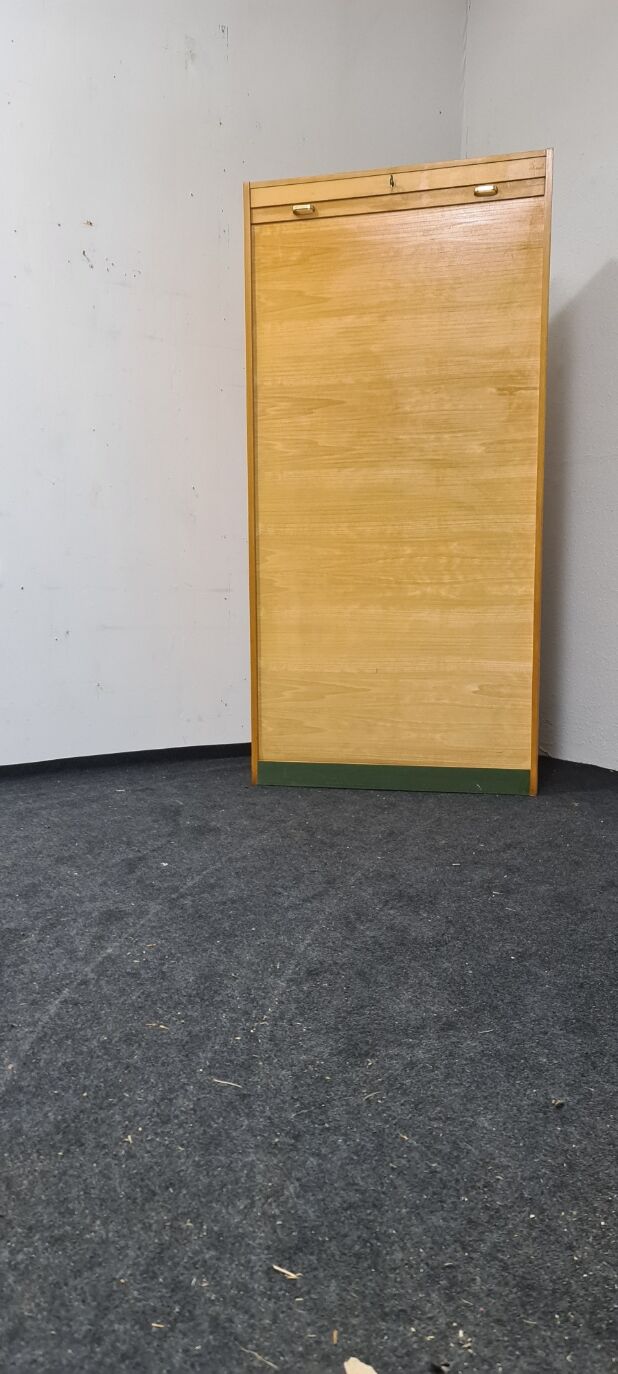 Vintage roll front cabinet by Wini