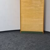 Vintage roll front cabinet by Wini