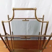 Neo-classical brass magazine rack in the spirit of Maison Jansen.