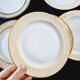 Set of 6 Limoges porcelain soup plates, decorated with gold 24