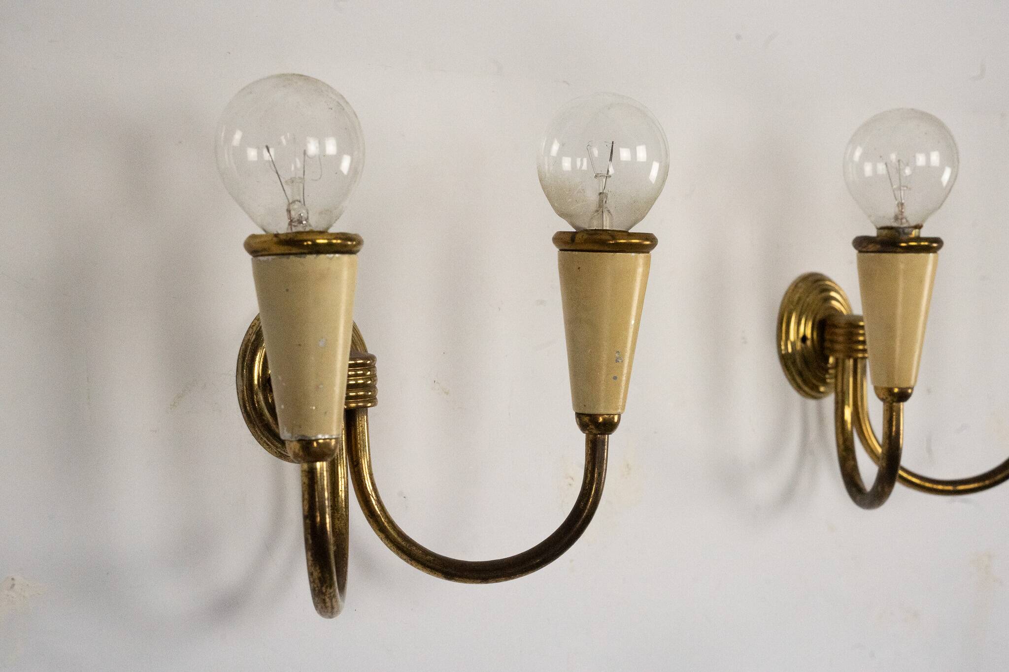 Set of four Mid-Century sconces in lacquer and brass. Italy 1950s