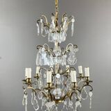Bronze, brass and crystal chandelier, early 20th century.