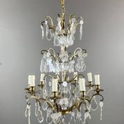 Bronze, brass and crystal chandelier, early 20th century.