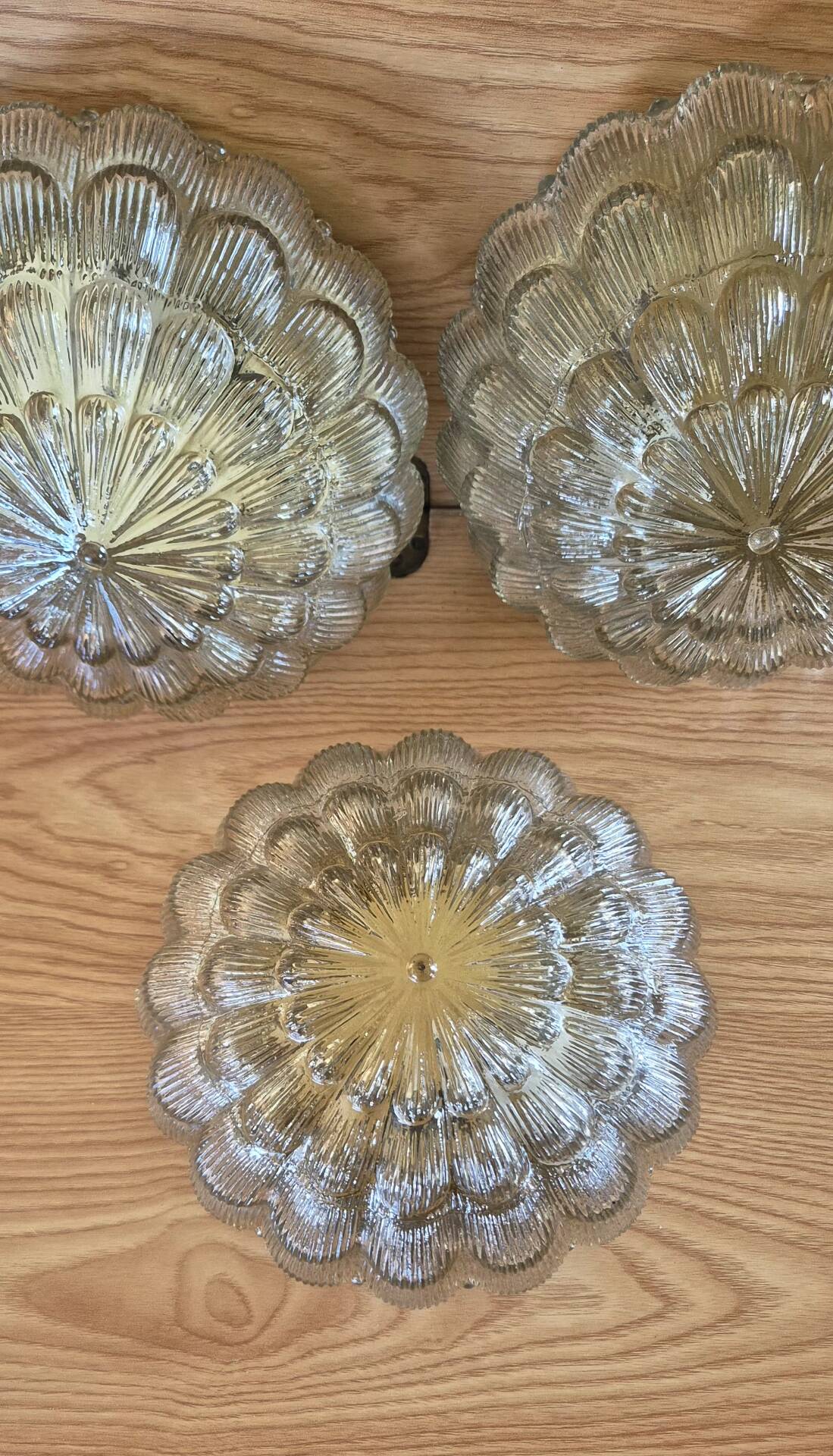 Set of 3 vintage amber moulded glass wall lights and ceiling lights.