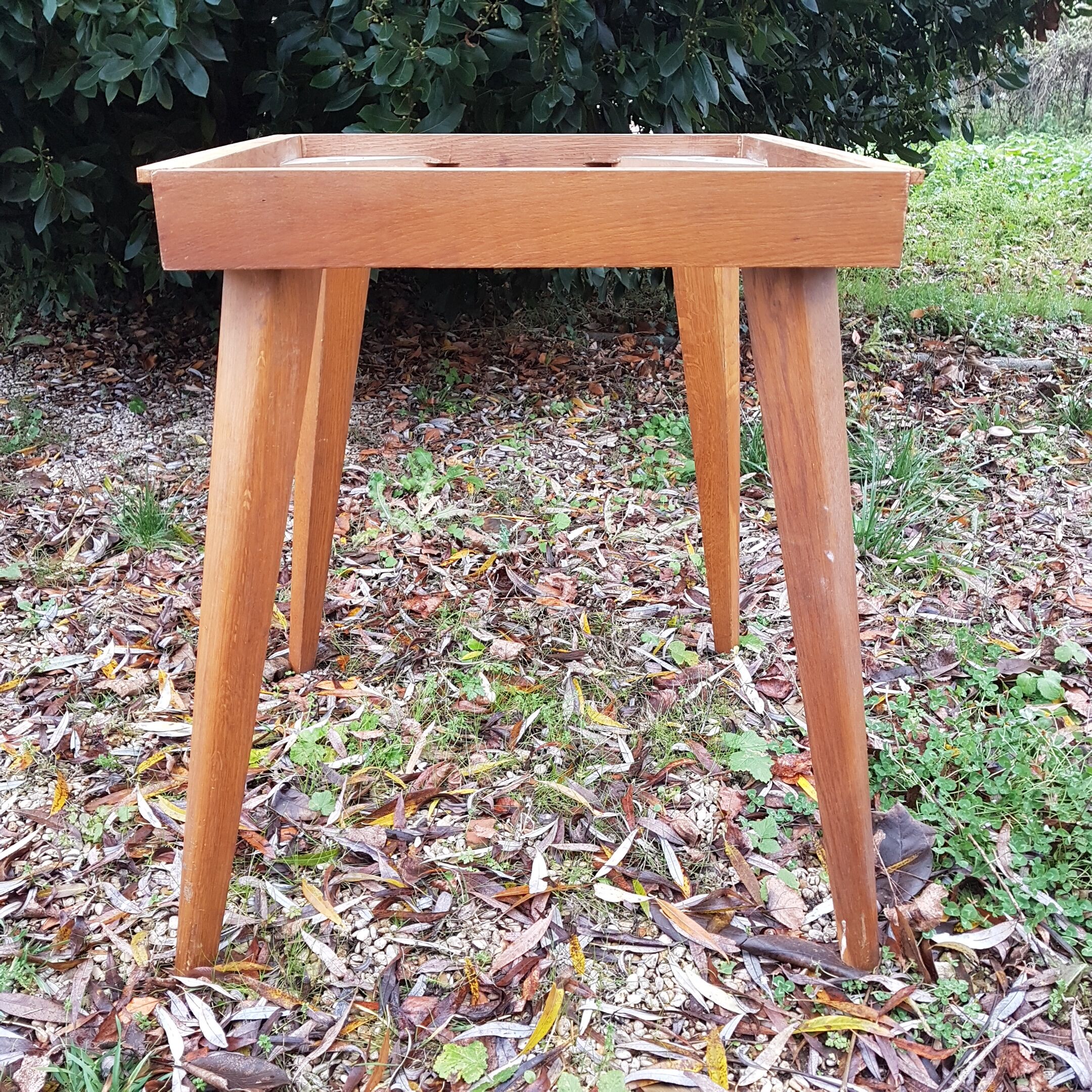 Vintage table with compass feet