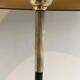 Floor lamp in black lacquered metal and brass