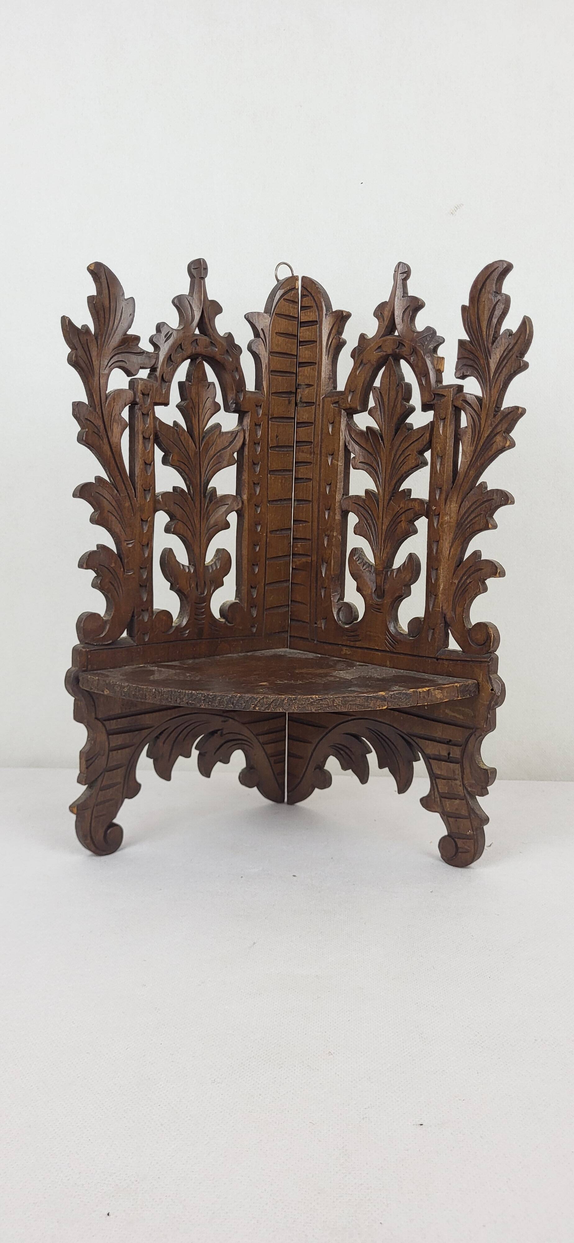 Carved wooden corner shelf