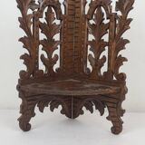 Carved wooden corner shelf