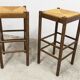 Pair of 80 cm high straw and beech bar stools