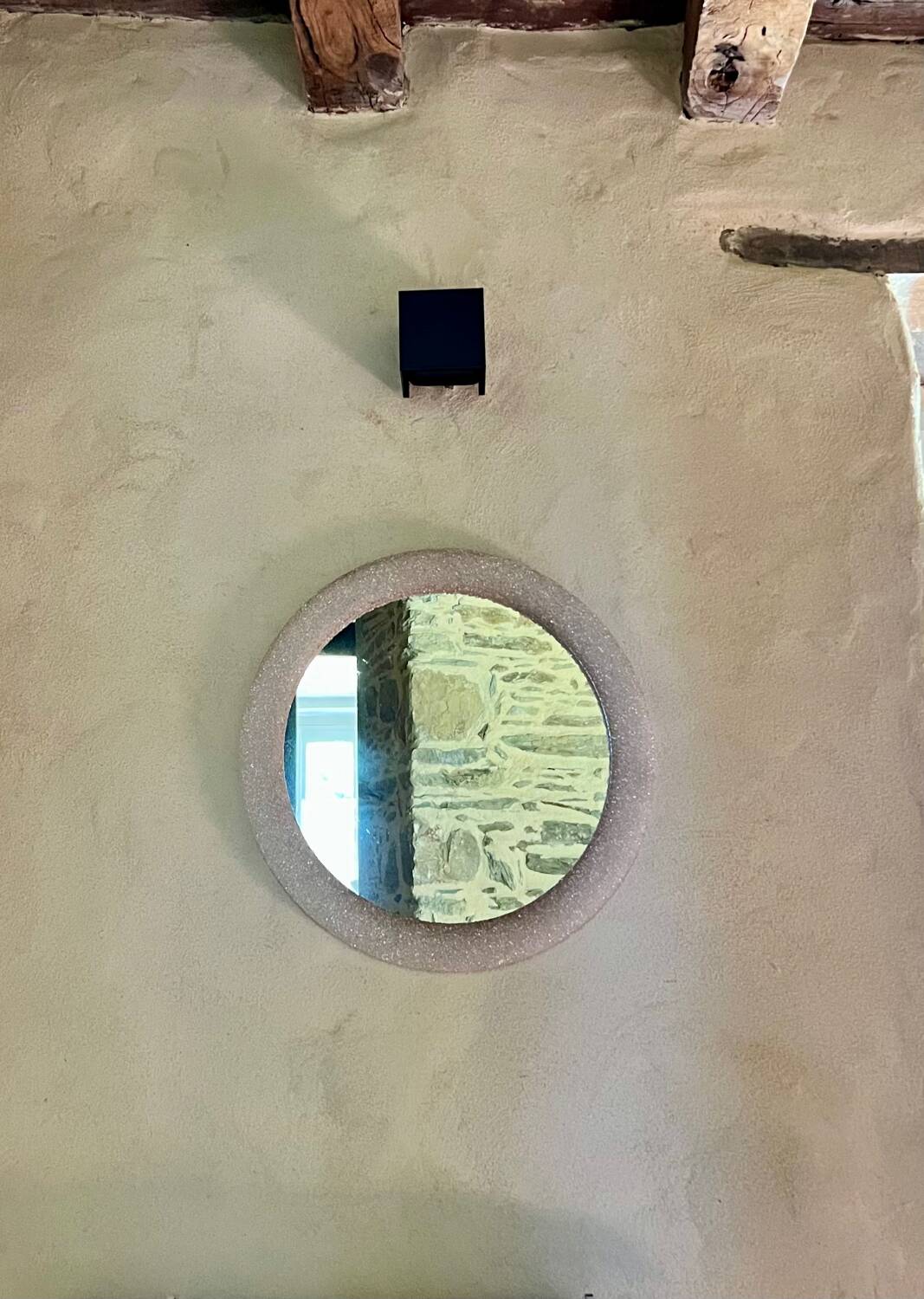 Round mirror in granite perspex, 1970s