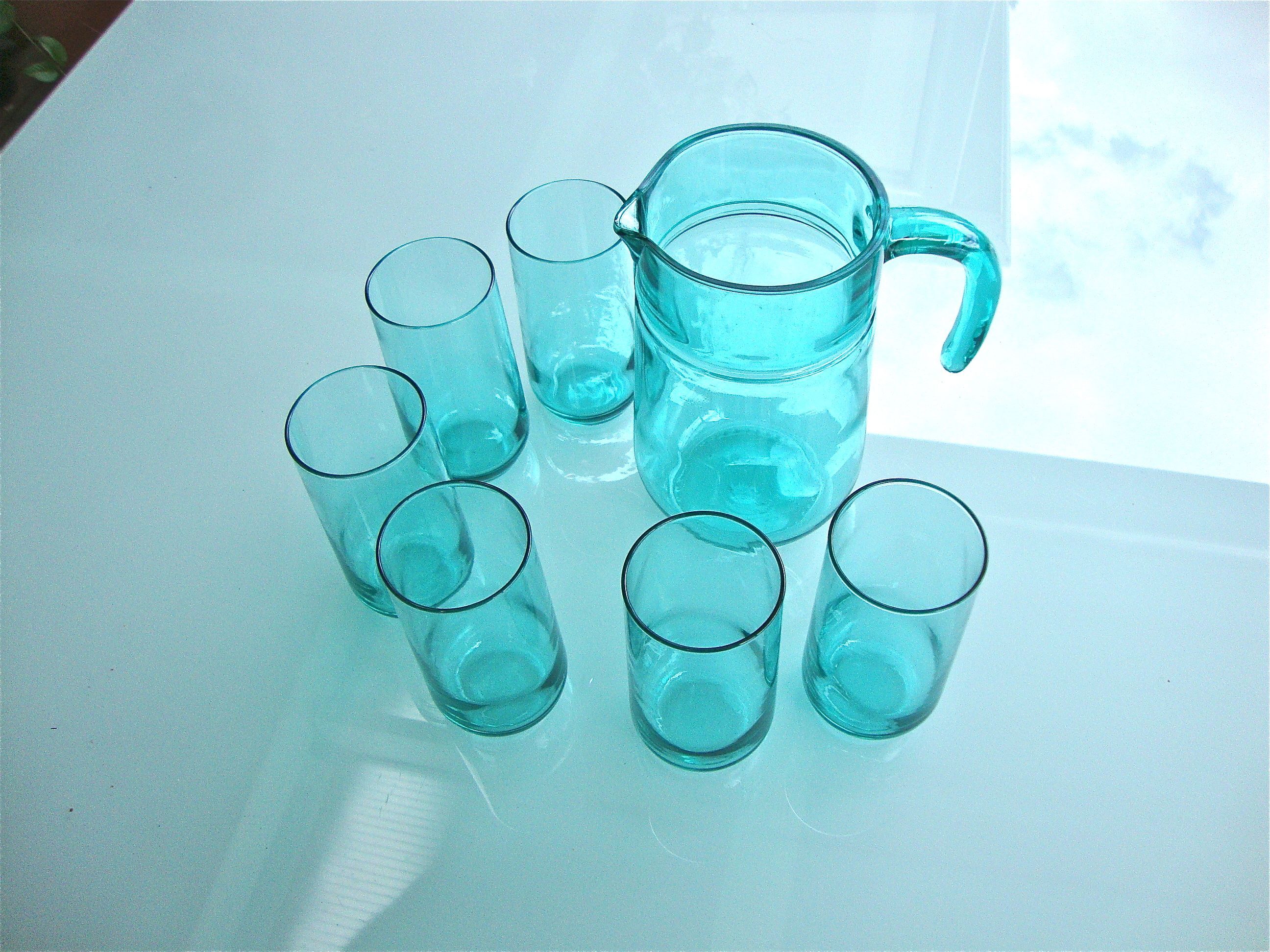 Set of 6 glasses with orangeade and carafe