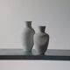 Pair of vintage biscuit porcelain vases by Metzler Ortloff.